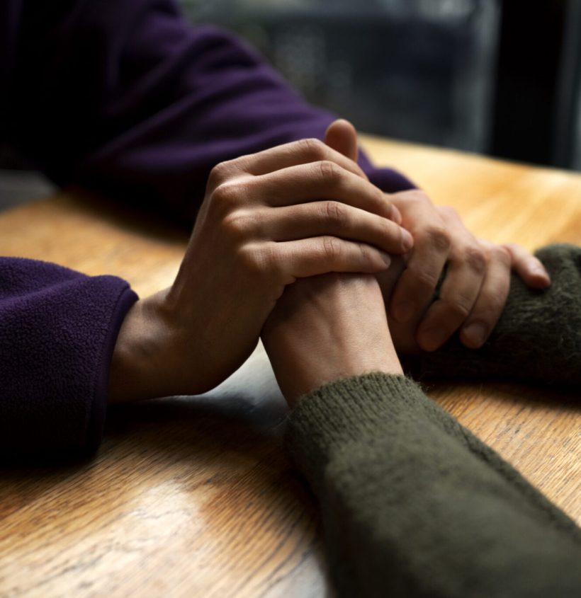 hands-holding-each-other-support